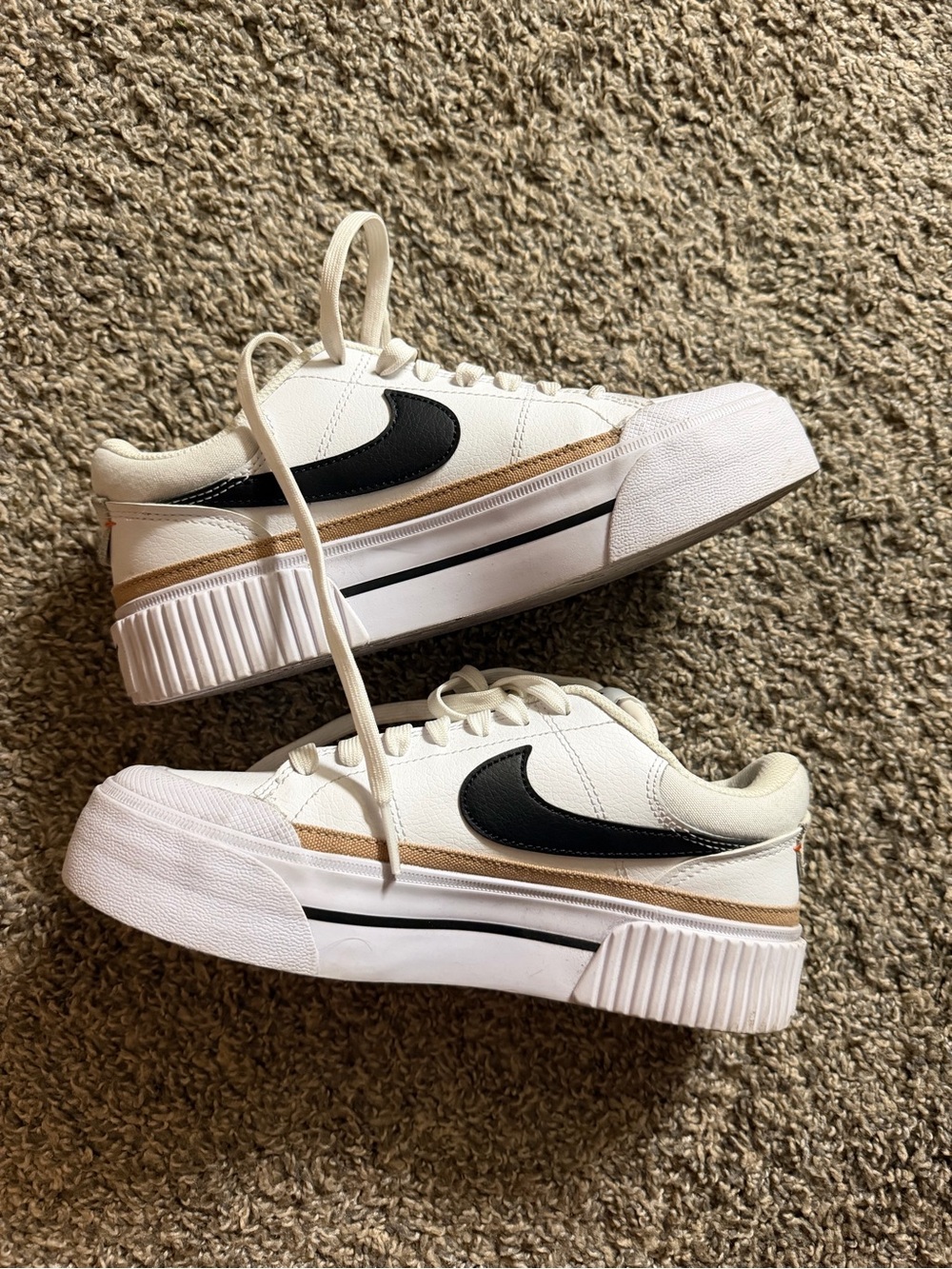Woman’s Nike Platform Sneakers in White with Black Swoosh 6.5